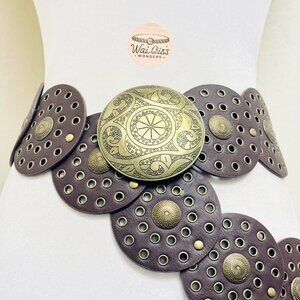 Brown leather belt with gold tone metal circles and floral design